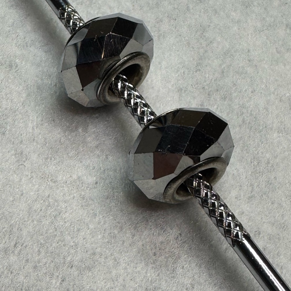 5/$20 single Faceted Charm Bead